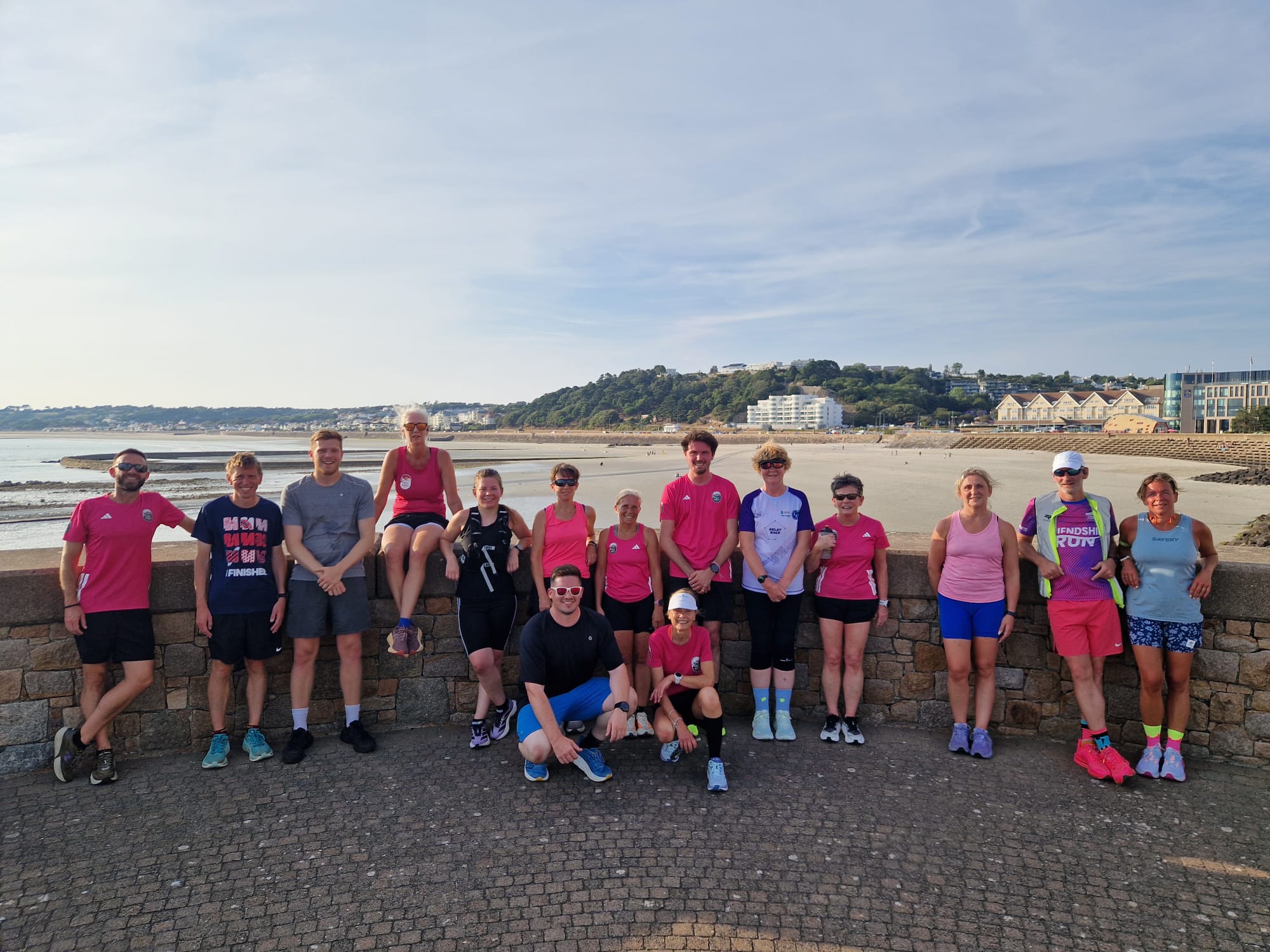 A group of smiling runners after enjoying a tough Rock N Road Runners Interval session! 